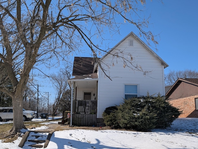 view of snow covered property