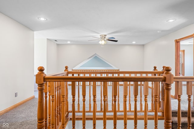 hall featuring carpet, baseboards, and recessed lighting