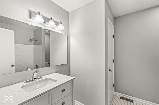 full bathroom featuring baseboards, visible vents, toilet, tile patterned flooring, and vanity