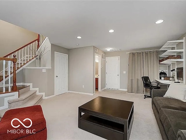 living room with recessed lighting, stairs, baseboards, and light colored carpet