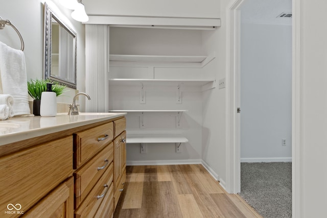 pantry featuring a sink