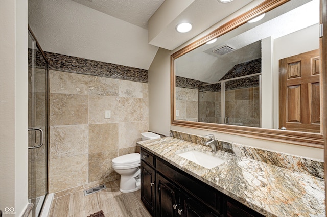 690 N 600 W, Lebanon, IN 46052 - full bath with a stall shower, tile walls, toilet, and vanity