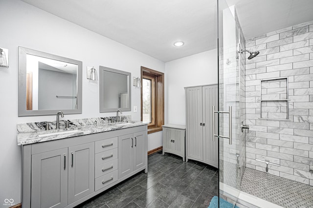 690 N 600 W, Lebanon, IN 46052 - full bathroom featuring a tile shower, double vanity, and a sink
