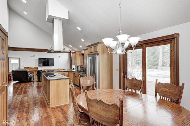 690 N 600 W, Lebanon, IN 46052 - dining area featuring lofted ceiling, a textured ceiling, hardwood / wood-style flooring, recessed lighting, and a notable chandelier