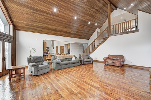 690 N 600 W, Lebanon, IN 46052 - living area with french doors, light wood finished floors, stairway, wood ceiling, and high vaulted ceiling