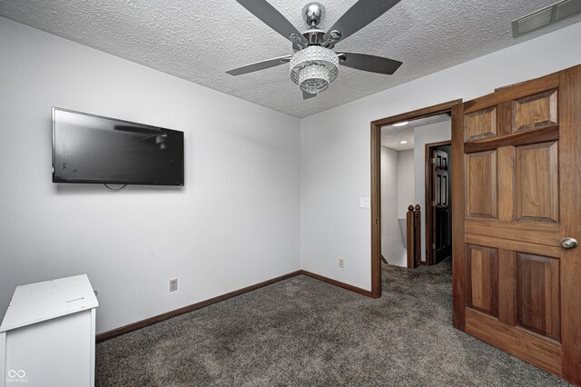 690 N 600 W, Lebanon, IN 46052 - unfurnished bedroom with carpet, visible vents, ceiling fan, a textured ceiling, and baseboards
