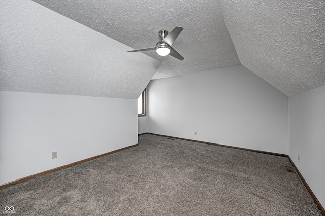 690 N 600 W, Lebanon, IN 46052 - bonus room featuring carpet, visible vents, vaulted ceiling, and baseboards