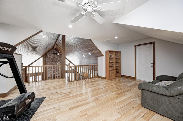 690 N 600 W, Lebanon, IN 46052 - workout area with wood finished floors, visible vents, a ceiling fan, vaulted ceiling, and baseboards