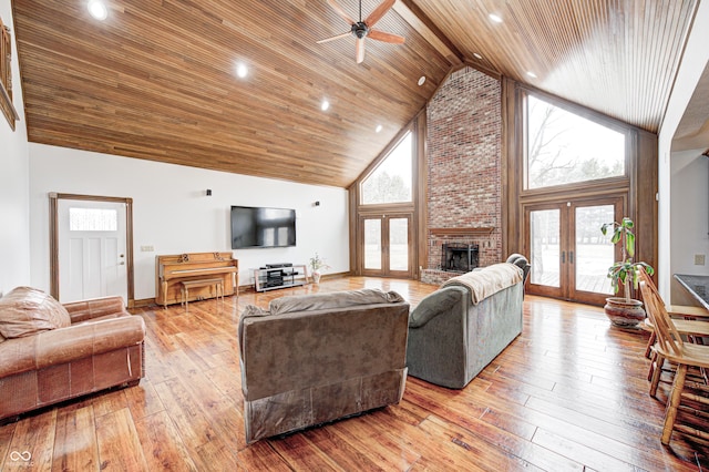 690 N 600 W, Lebanon, IN 46052 - living room featuring wooden ceiling, wood-type flooring, french doors, a fireplace, and high vaulted ceiling