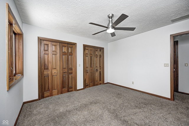 690 N 600 W, Lebanon, IN 46052 - unfurnished bedroom featuring baseboards, carpet floors, visible vents, and multiple closets