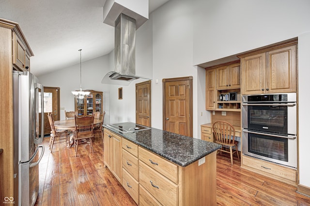 690 N 600 W, Lebanon, IN 46052 - kitchen featuring a chandelier, island range hood, stainless steel appliances, a kitchen island, and light wood finished floors