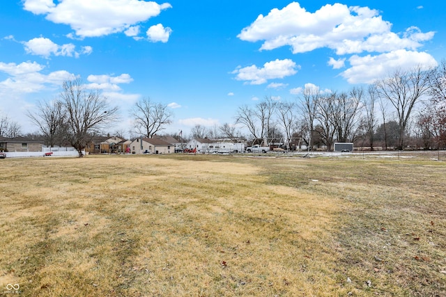 view of yard featuring a residential view