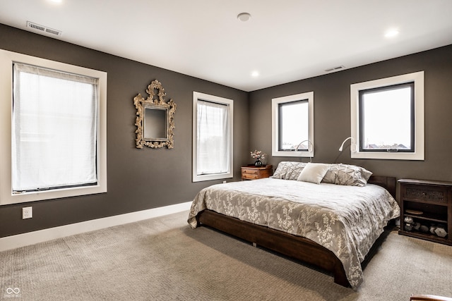 bedroom featuring carpet, visible vents, baseboards, and recessed lighting