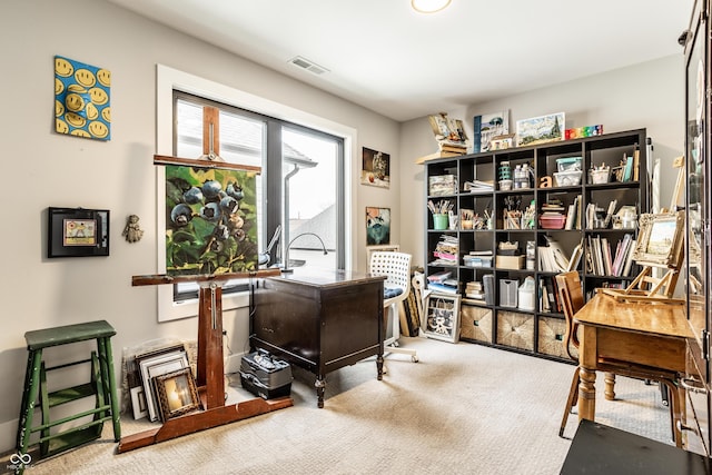 carpeted home office featuring visible vents