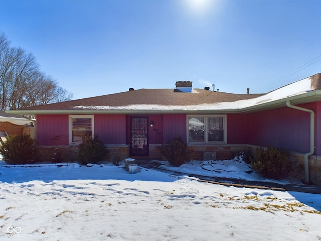 single story home featuring a garage