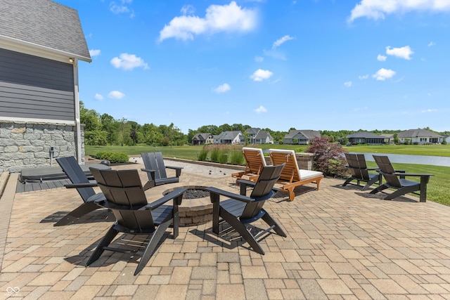 view of patio / terrace featuring a fire pit