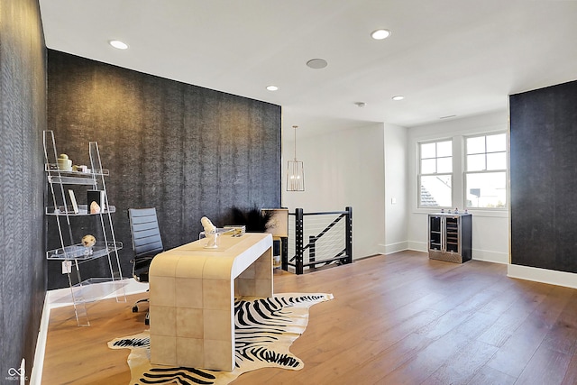 office with recessed lighting, baseboards, and wood finished floors