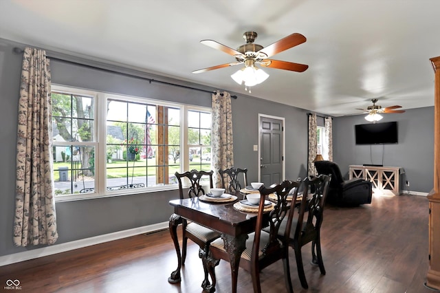 dining area featuring dark wood-style floors, ceiling fan, and baseboards