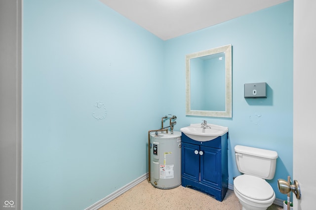 half bath featuring baseboards, water heater, vanity, and toilet