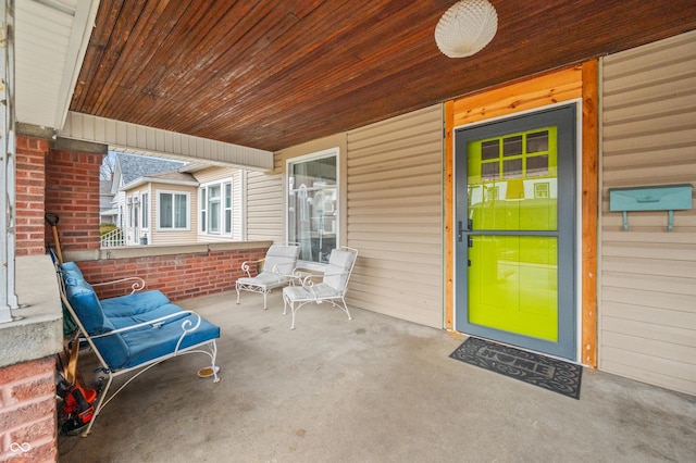 view of patio featuring a porch