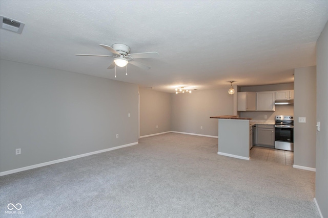 unfurnished living room with light carpet, a textured ceiling, visible vents, and a ceiling fan