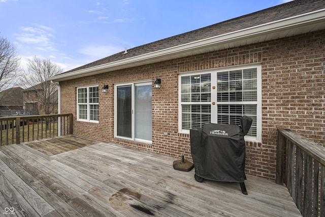 wooden terrace with grilling area