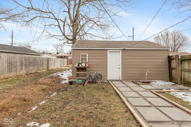 exterior space featuring a fenced backyard and a yard