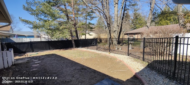 view of yard with a fenced backyard