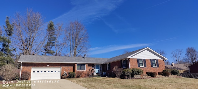 single story home featuring an attached garage, brick siding, concrete driveway, and a front yard