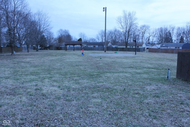 view of yard with fence