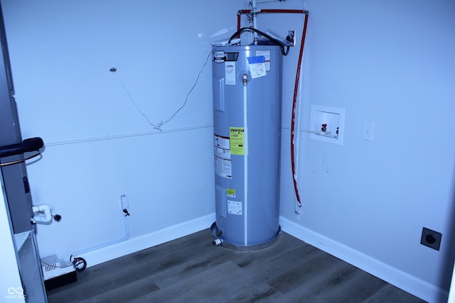 utility room with electric water heater