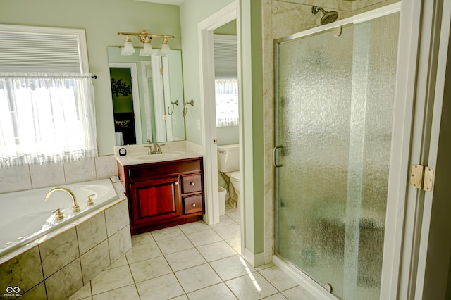 full bathroom with toilet, a stall shower, tile patterned flooring, and a garden tub