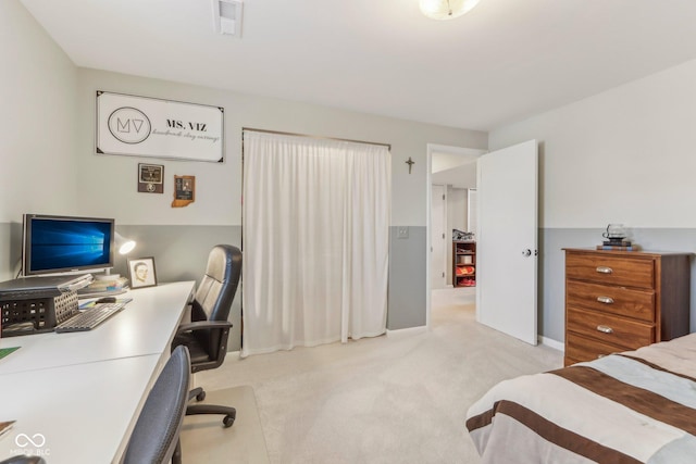 bedroom with carpet, visible vents, and baseboards