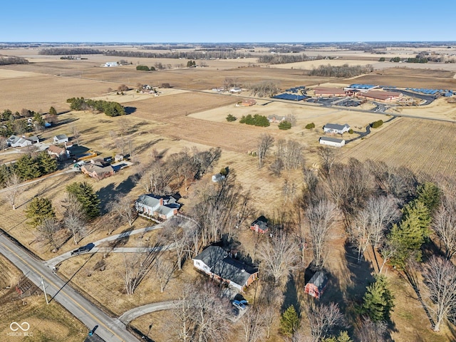 birds eye view of property featuring a rural view