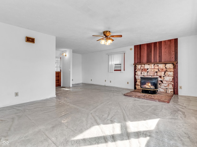 unfurnished living room with a ceiling fan, concrete floors, and a textured ceiling