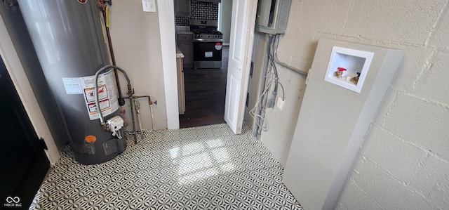 utility room with water heater