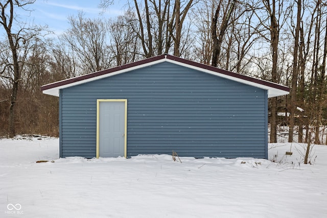 view of snow covered garage