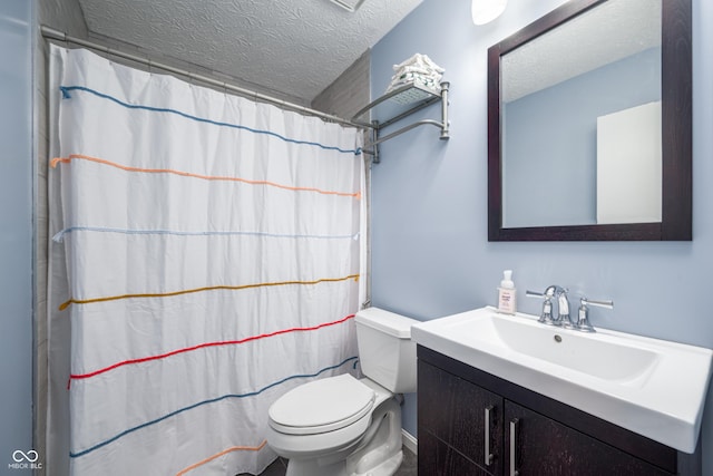 full bath featuring toilet, curtained shower, a textured ceiling, and vanity