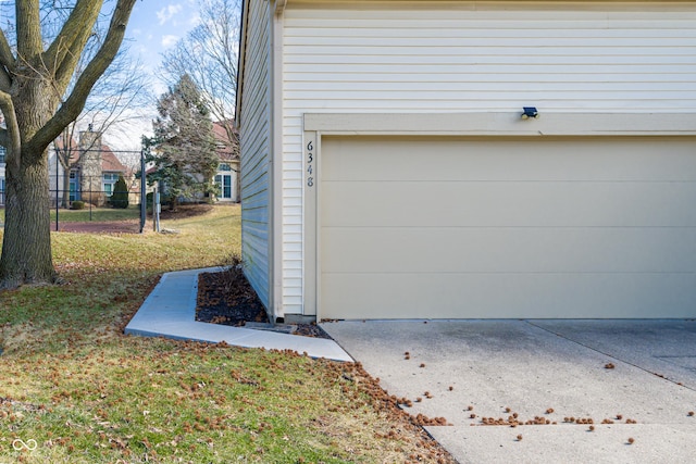 garage with fence