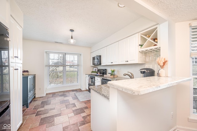 kitchen with black microwave, dishwashing machine, a peninsula, electric range, and white cabinetry