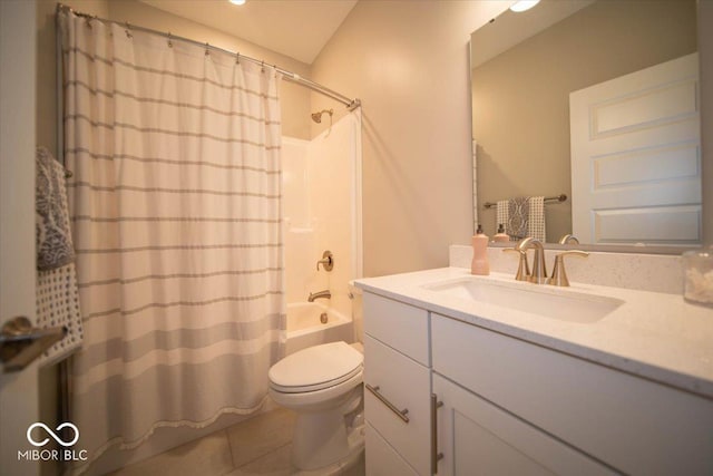 bathroom featuring shower / tub combo, vanity, toilet, and tile patterned floors