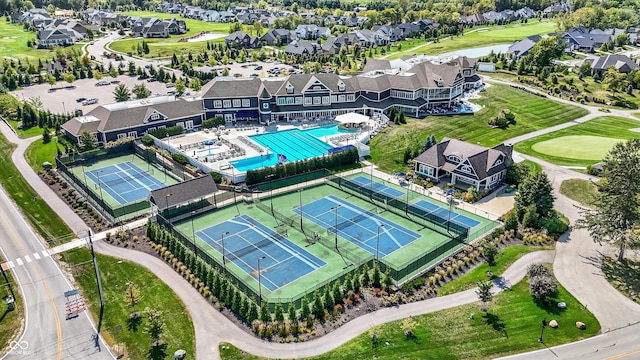 bird's eye view with view of golf course and a residential view
