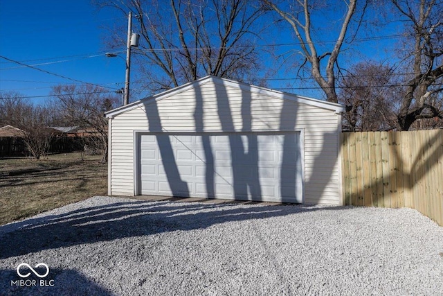 detached garage with fence