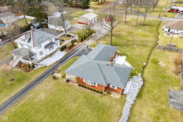 birds eye view of property with a residential view