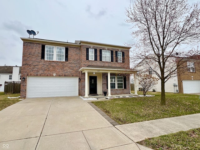 view of front facade featuring concrete driveway, a garage, brick siding, and a front yard