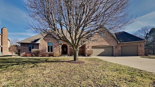 view of front facade with brick siding, a shingled roof, concrete driveway, an attached garage, and a front lawn