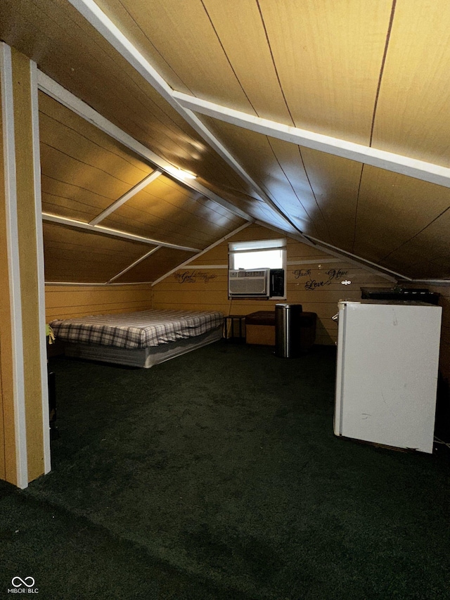 additional living space featuring lofted ceiling, dark colored carpet, and cooling unit