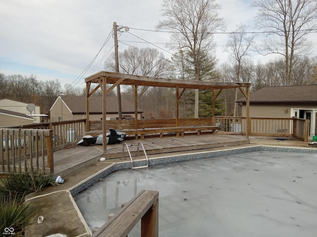 view of swimming pool featuring a wooden deck and a pergola