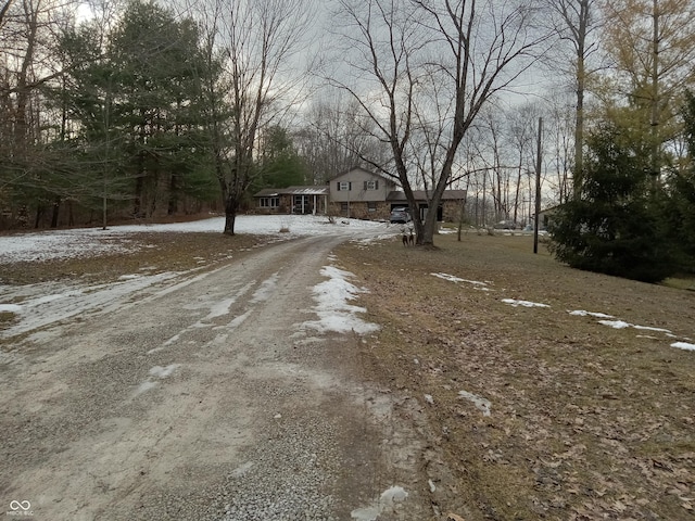 view of road featuring driveway