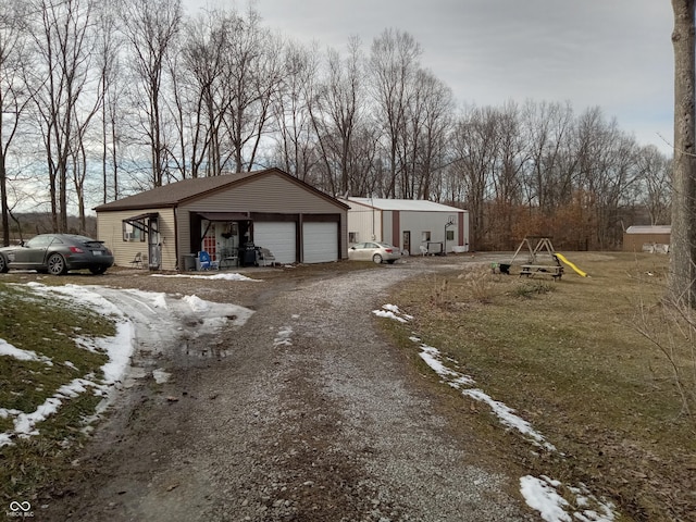 exterior space featuring a detached garage